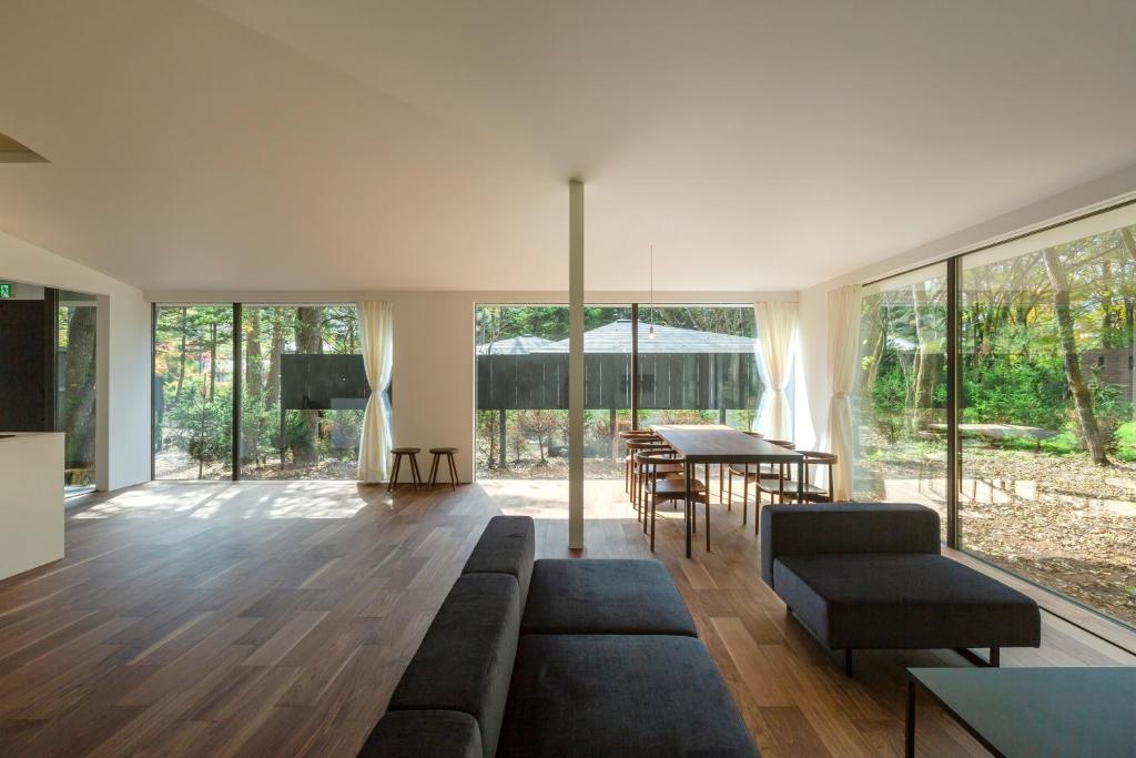 a living room with a couch and a table at Mori no Hanare in Karuizawa