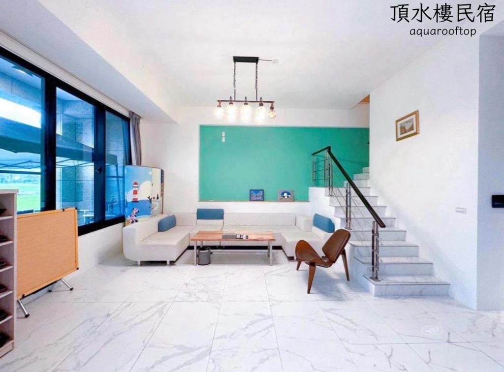 Katil atau katil-katil dalam bilik di Aqua rooftop 頂水樓玩趣民宿