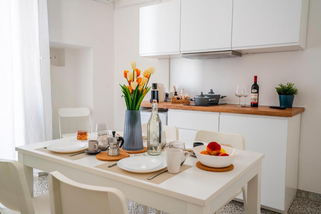 Kuchyň nebo kuchyňský kout v ubytování Modì