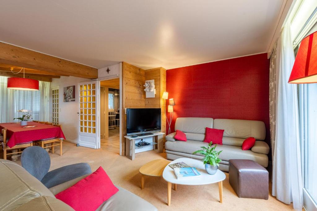 Χώρος καθιστικού στο Ourson 3