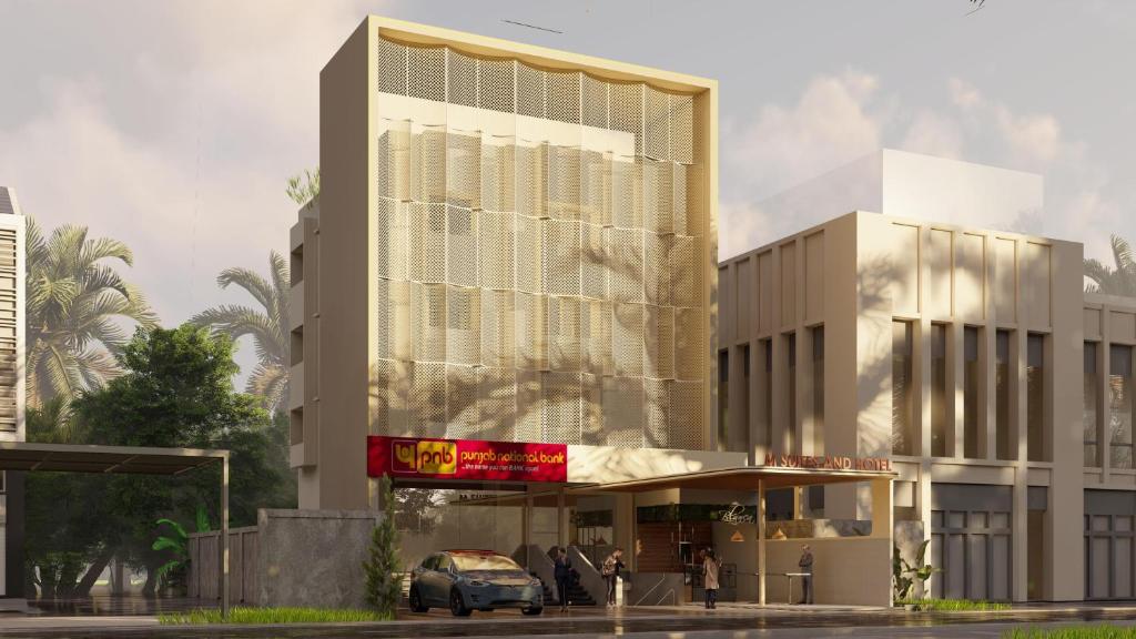 un rendimiento arquitectónico de un edificio en M Suites And Hotel, en Kochi