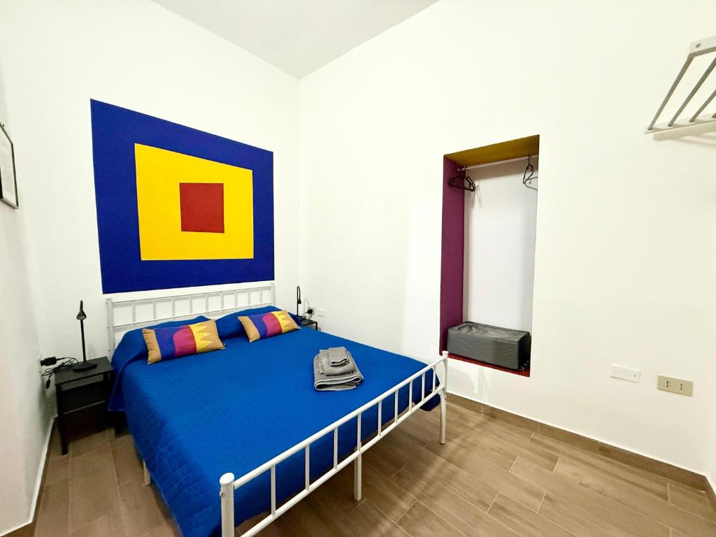 Postel nebo postele na pokoji v ubytování Vicolo Giardi