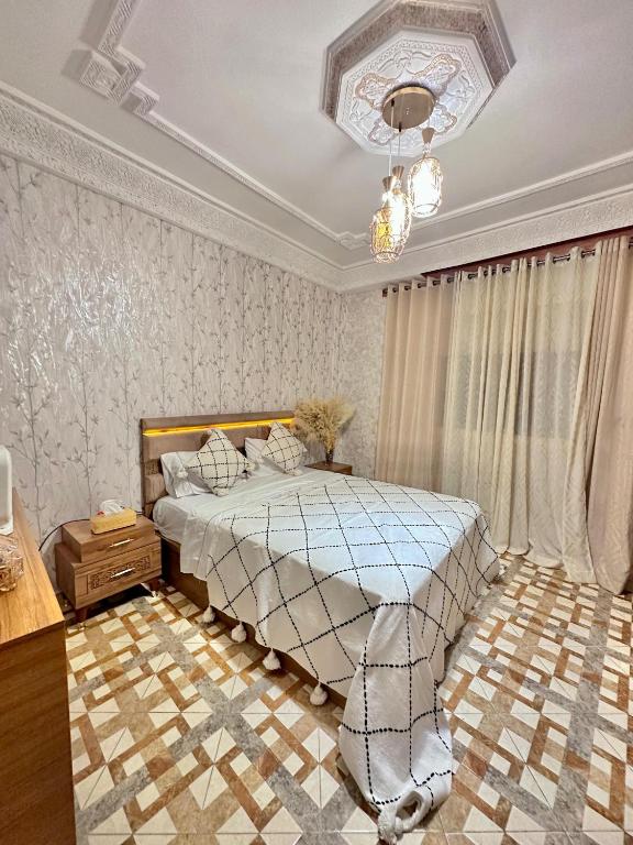 Postel nebo postele na pokoji v ubytování Abdo