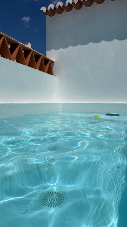 a room with a pool of water at Casa Vó Briata in Mértola
