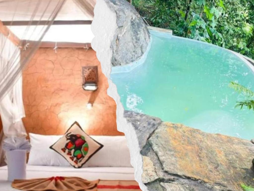a room with a bed next to a swimming pool at Mati Gedara Resort in Digana