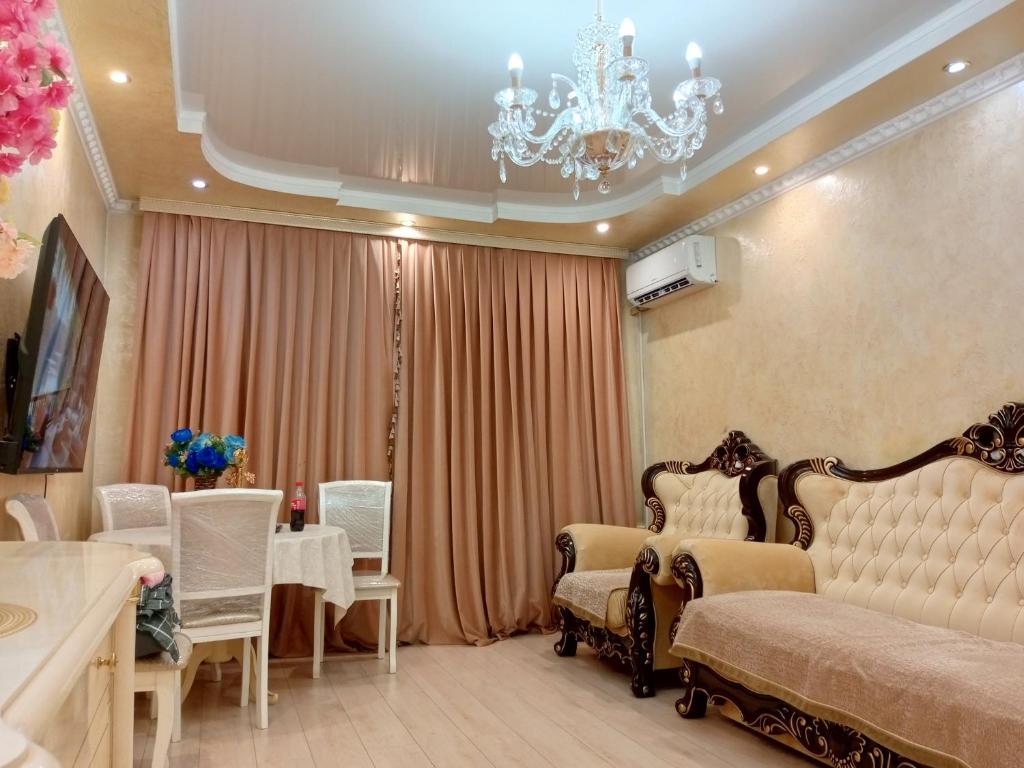 TV a/nebo společenská místnost v ubytování 3 Rooms of the Sun