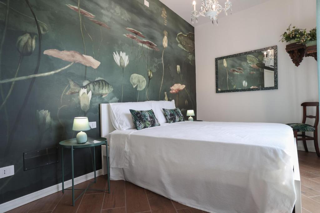 Ένα ή περισσότερα κρεβάτια σε δωμάτιο στο Apartments Le Rondini 2