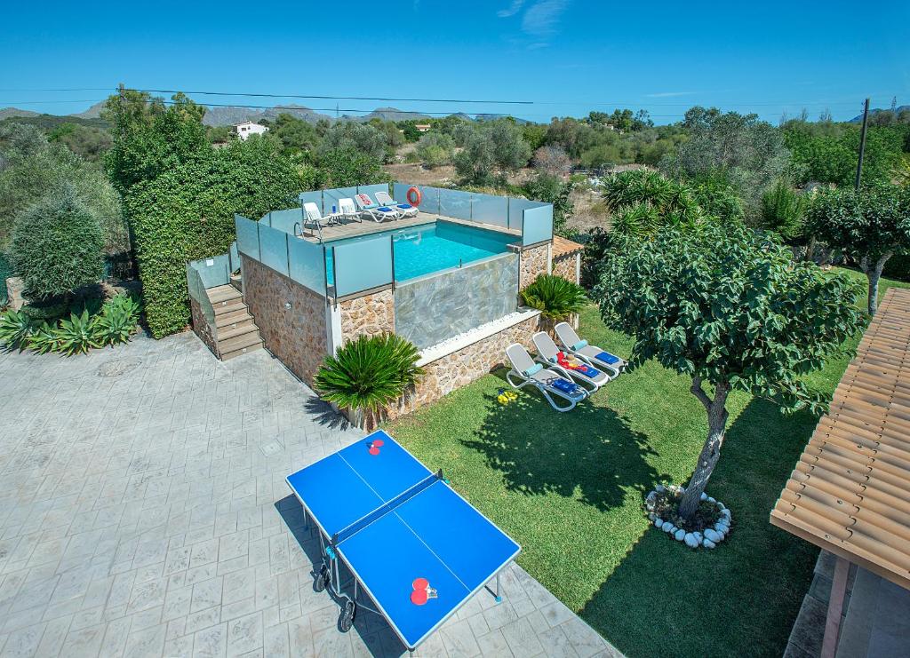 an overhead view of a house with a swimming pool at Owl Booking Villa Rafale - 5 Min Drive to The Beach in El Port