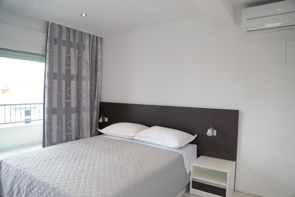 Postel nebo postele na pokoji v ubytování Apartment Nada