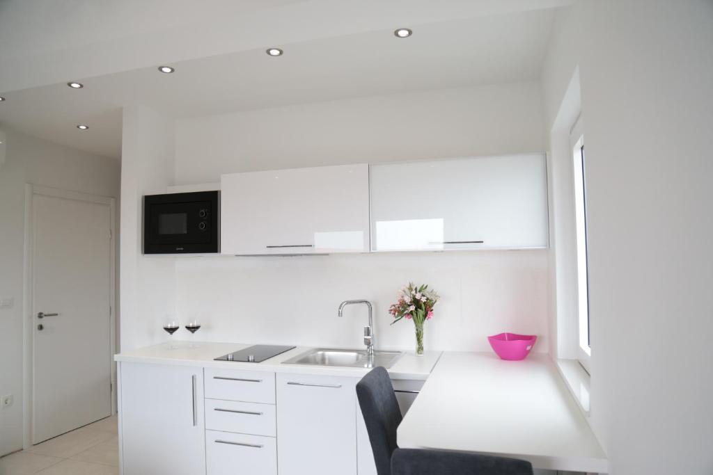 Kuchyň nebo kuchyňský kout v ubytování Apartment Nada
