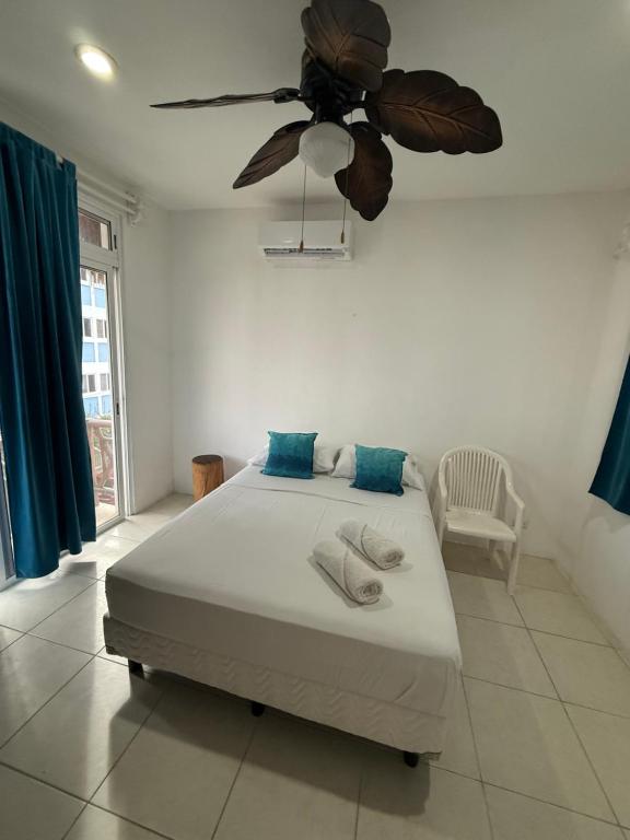 En eller flere senge i et værelse på SelvaMar Estudios Playa