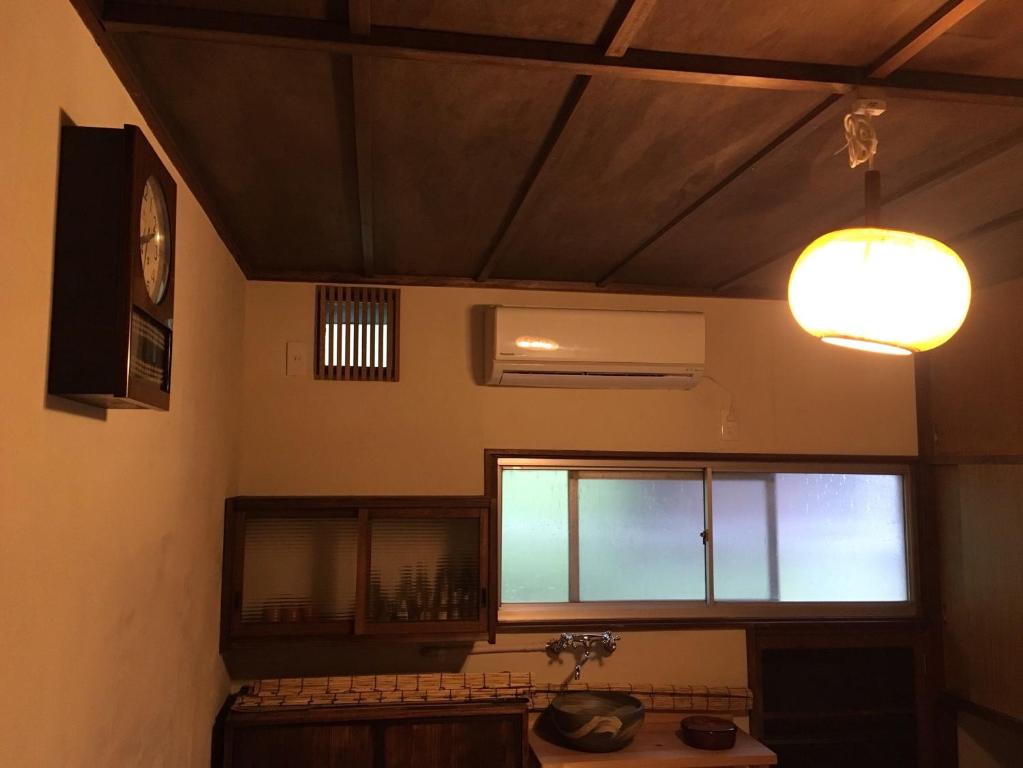 TV a/nebo společenská místnost v ubytování Kagaribi Guesthouse
