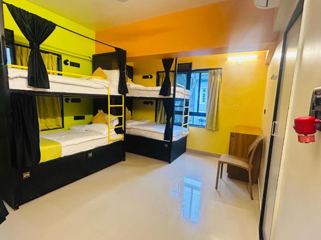 Ένα ή περισσότερα κρεβάτια σε δωμάτιο στο Move Inn