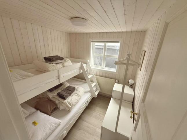 Un pat sau paturi într-o cameră la Cozy cottage in Golden Circle