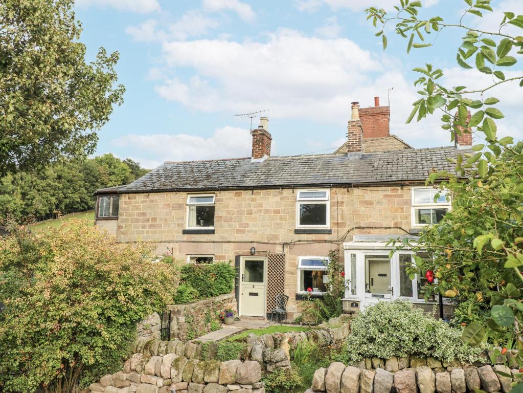 an exterior view of a brick house at 5 Belper Lane End in Belper