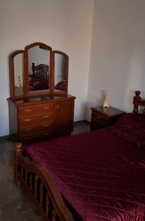 Ένα ή περισσότερα κρεβάτια σε δωμάτιο στο MKM Departamento 1