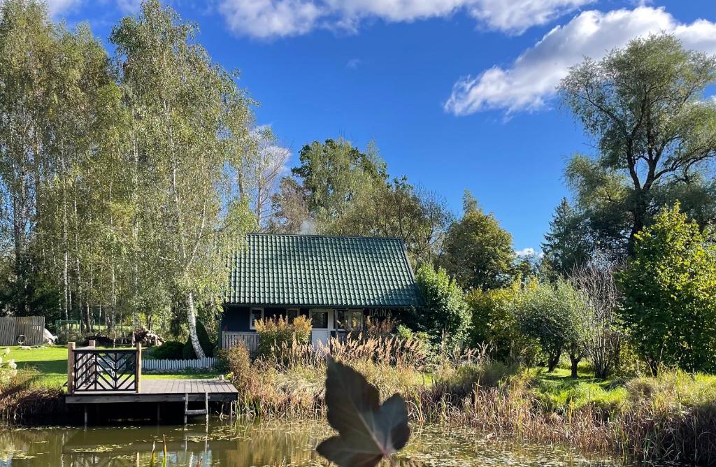 Fotografie z fotogalerie ubytování EZERI - weekend home with sauna and tub v destinaci Augšlīgatne