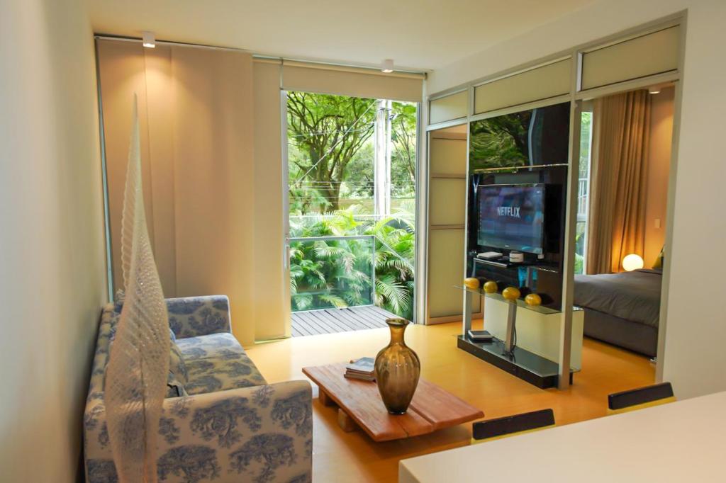 TV a/nebo společenská místnost v ubytování Apto en Cali Moderno con Balcón, Piscina & Terraza