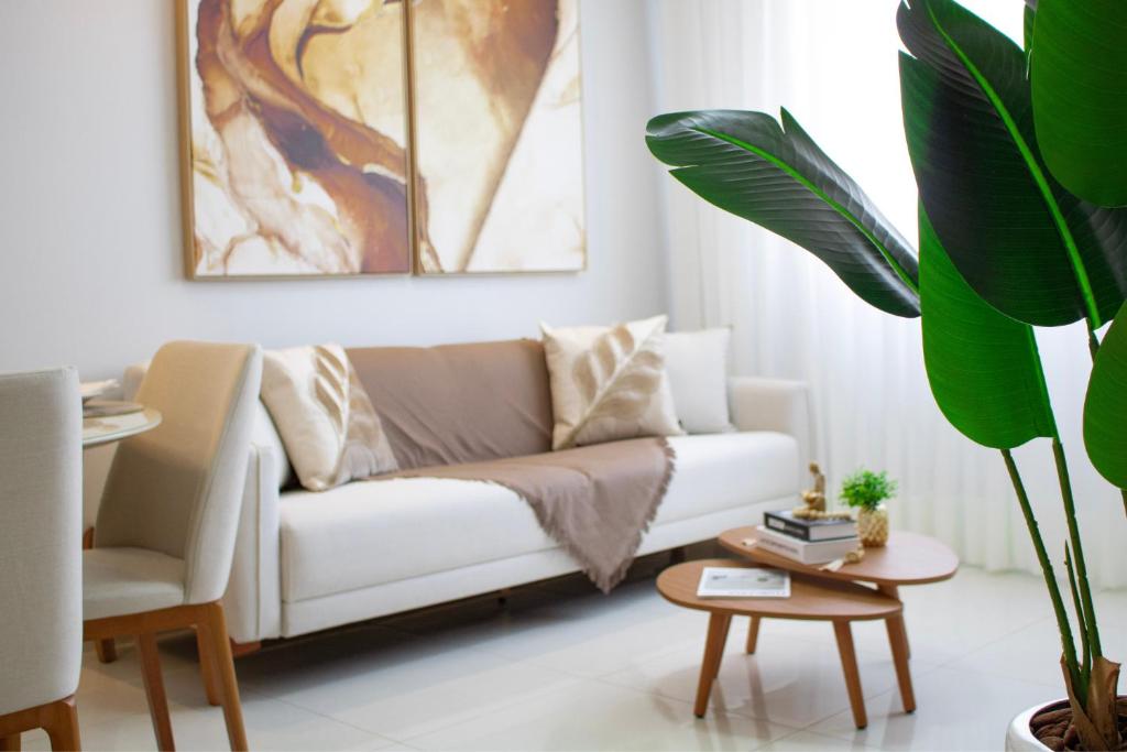 Et opholdsområde på Janelas do Rio - Apartamento 2 quartos com vista para o Rio, Wi-Fi, ar-condicionado e máquina lava e seca