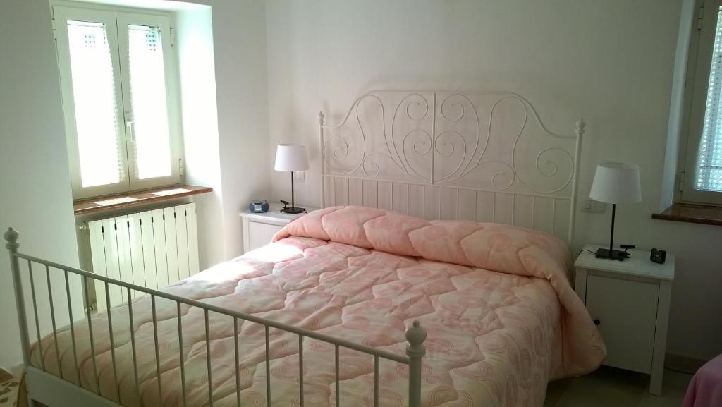 Postel nebo postele na pokoji v ubytování B&B I Tre Bassotti