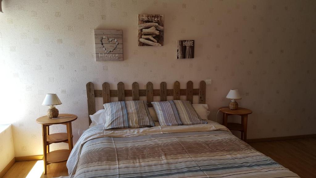 Postel nebo postele na pokoji v ubytování La Fresnée chambres d'hôtes