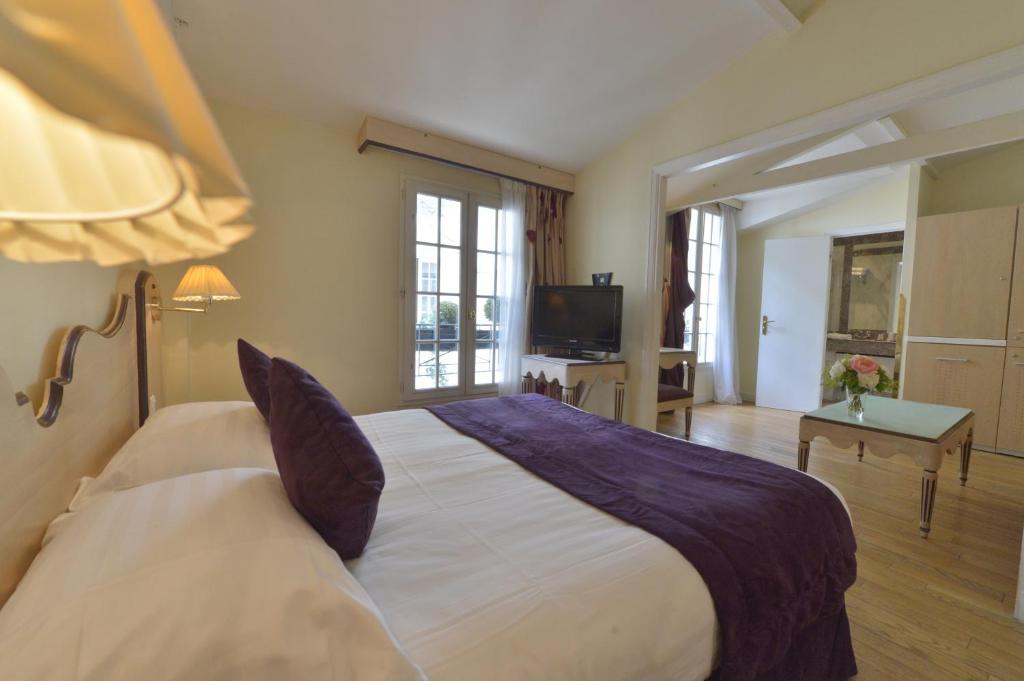 Hotel Suites Unic Renoir Saint-Germain - Resim 2