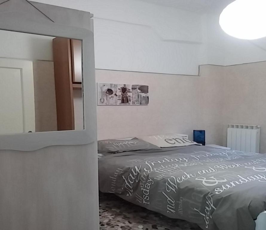 A bed or beds in a room at Casa sul rio
