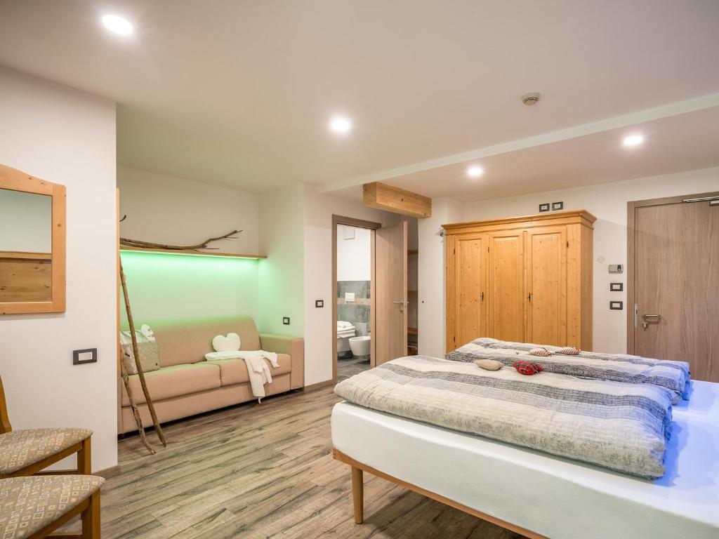 Postel nebo postele na pokoji v ubytování Albergo Panorama