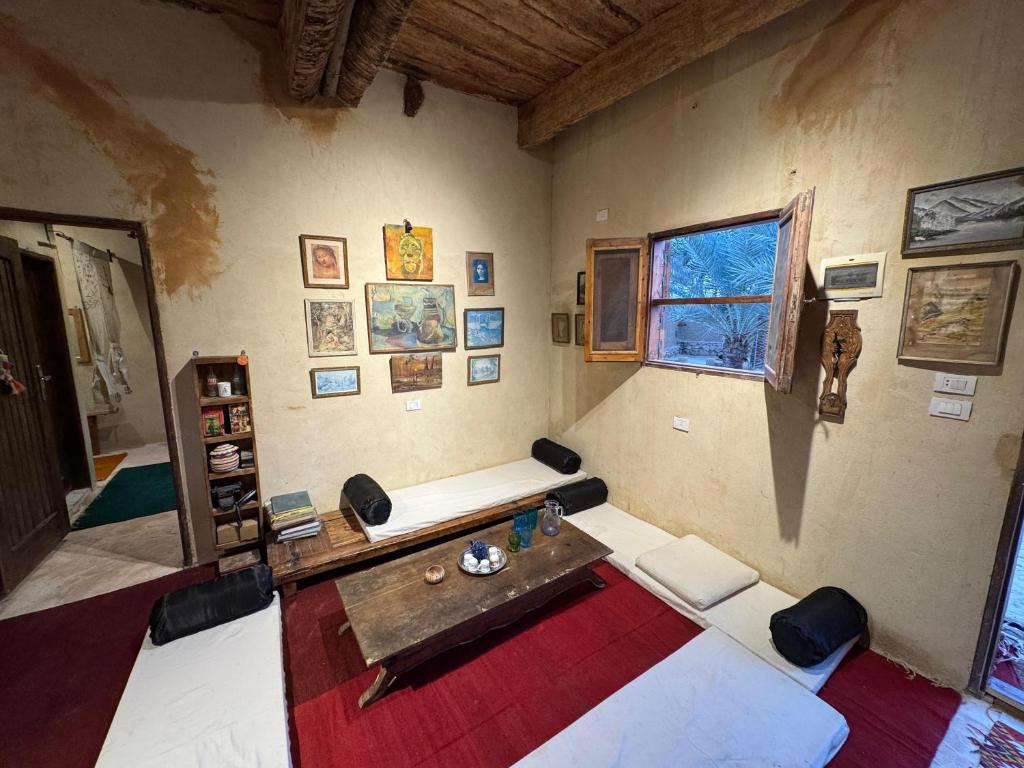 Ένα ή περισσότερα κρεβάτια σε δωμάτιο στο Tatrbent Siwa تاطربنت سيوة