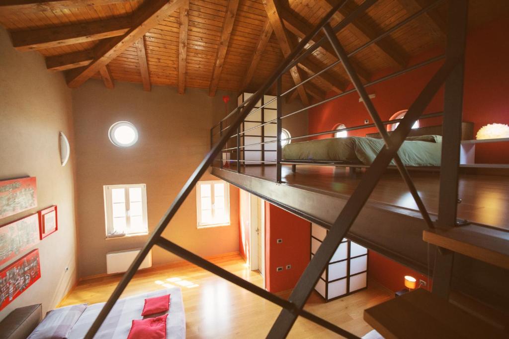Postel nebo postele na pokoji v ubytování Klinec Plešivo Art Rooms