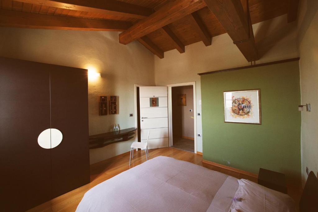 Postel nebo postele na pokoji v ubytování Klinec Plešivo Art Rooms