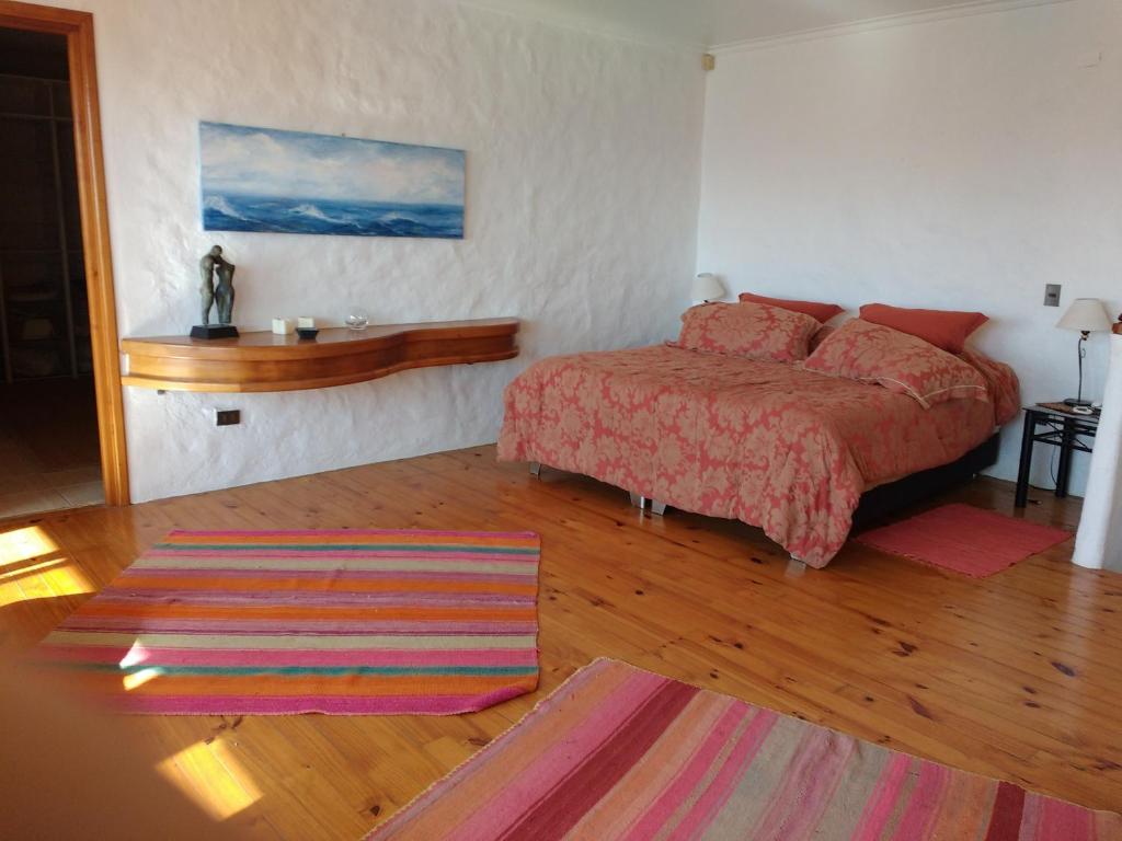 Postel nebo postele na pokoji v ubytování Casa Algarrobo Chile