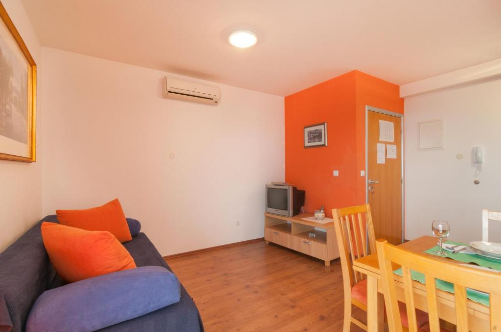 Televízia a/alebo spoločenská miestnosť v ubytovaní Apartment Božan