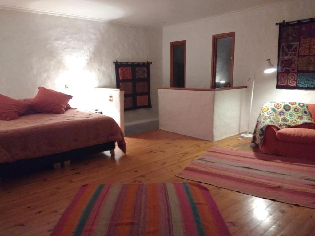 Postel nebo postele na pokoji v ubytování Casa Algarrobo Chile