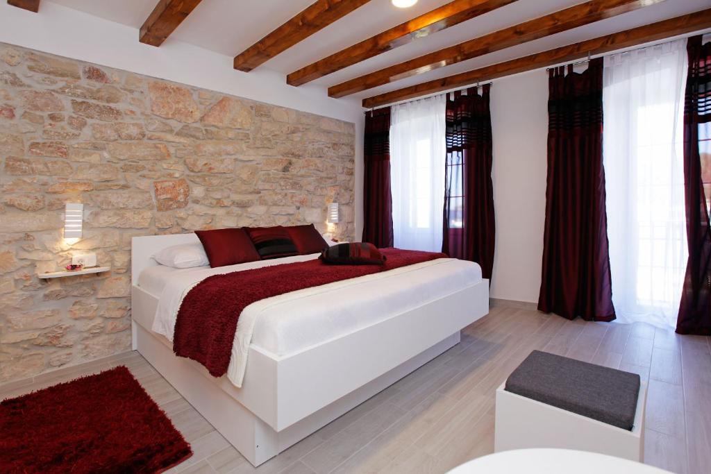 Postel nebo postele na pokoji v ubytování Luxory D-Rooms