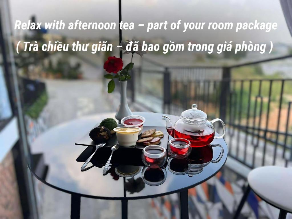 a tray with afternoon tea part of your room package at The Unique Home & Cafe Da Lat - Near Valley of Love in Da Lat