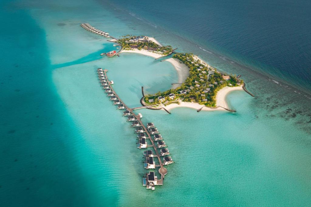 an aerial view of an island in the ocean at SO/ Maldives in South Male Atoll