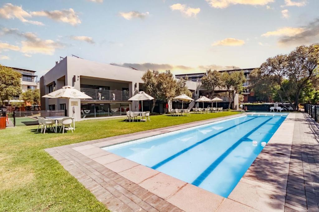 an image of a swimming pool at a resort at Modern 3-Bed Apartment Perfect for Family & Groups in Vosburg