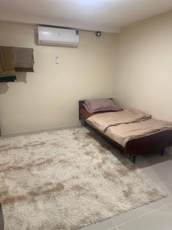 Postel nebo postele na pokoji v ubytování Homestay RAF