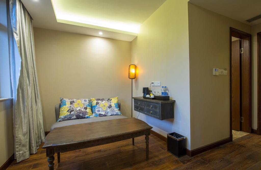 Voodi või voodid majutusasutuse Shanghai Soho Garden Hotel toas