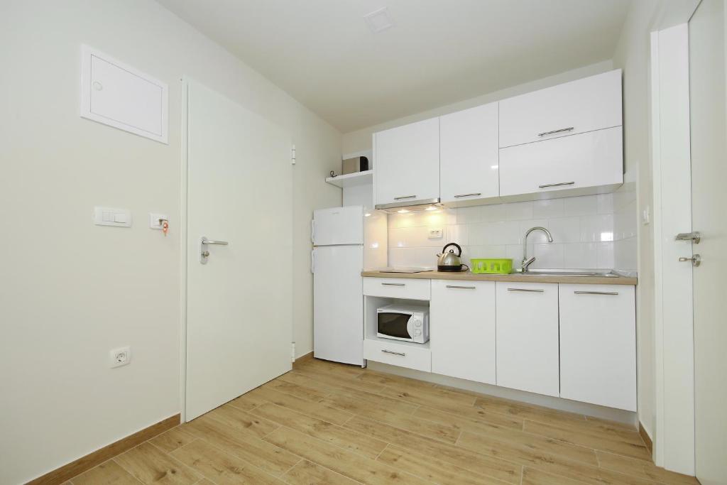 Kuchyň nebo kuchyňský kout v ubytování Idassa Atrium rooms