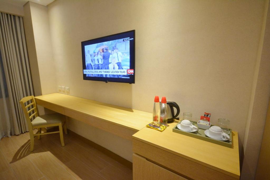 TV a/nebo společenská místnost v ubytování Jinjiang Inn - Makati