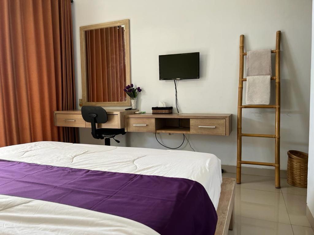 Μια τηλεόραση ή/και κέντρο ψυχαγωγίας στο Pulasari Homestay