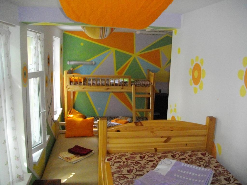 Postel nebo postele na pokoji v ubytování Just a Hostel