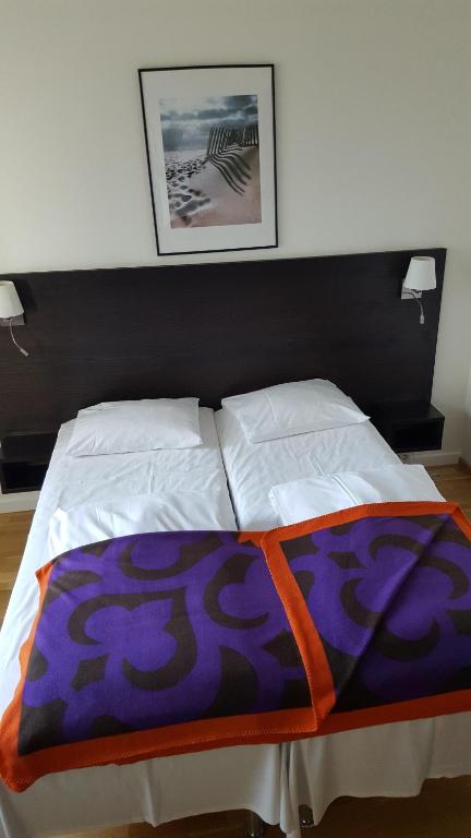 Postel nebo postele na pokoji v ubytování Hotel Montebello
