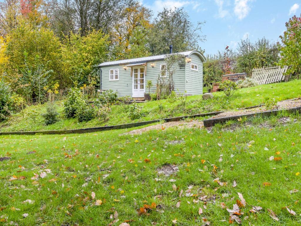 a small house in the middle of a field at Shepherds Retreat - Uk45531 in Buildwas