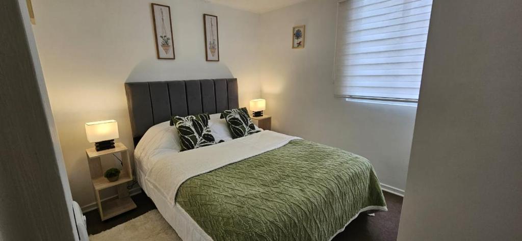 Ένα ή περισσότερα κρεβάτια σε δωμάτιο στο Preciosa habitación matrimonial parcking wifi