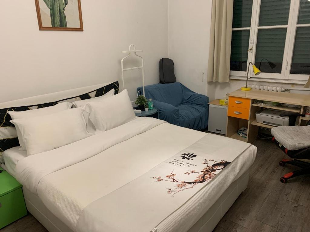 Postel nebo postele na pokoji v ubytování Private Room Wang