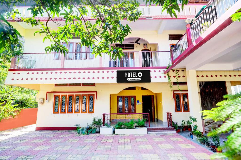 a view of the front of a building at Hotel O Modern Home in Guwahati