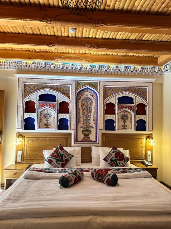 Ένα ή περισσότερα κρεβάτια σε δωμάτιο στο Hotel Fatima Boutique
